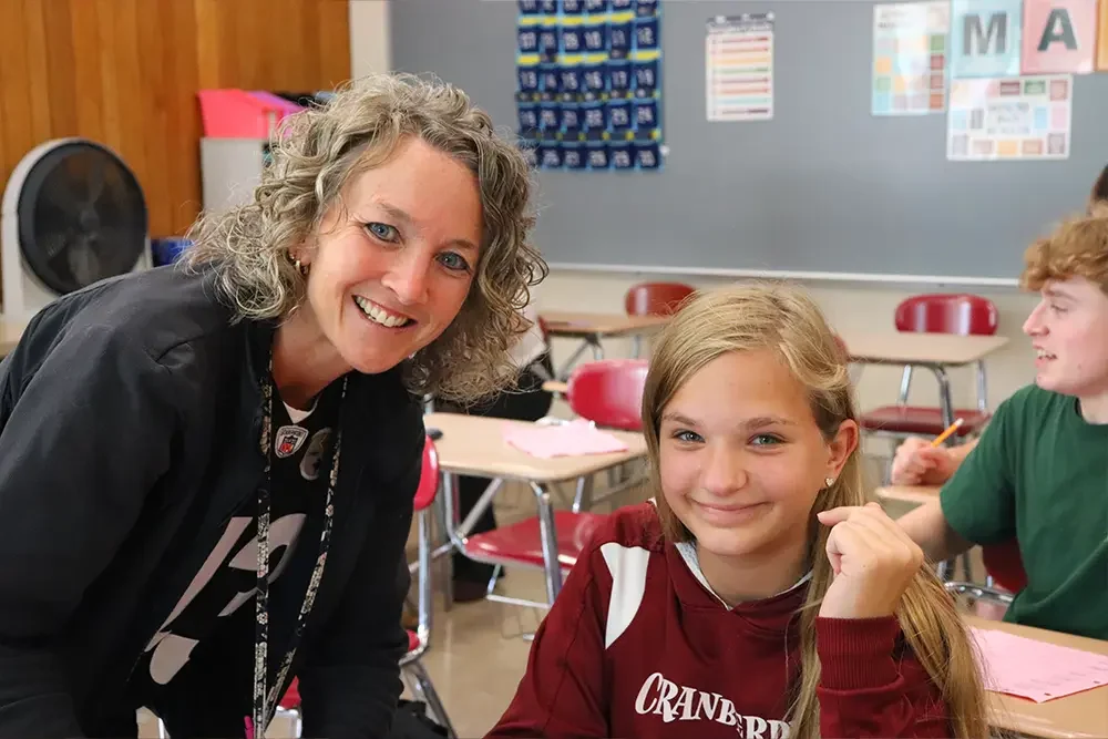 CHS Teacher Smiling with Student